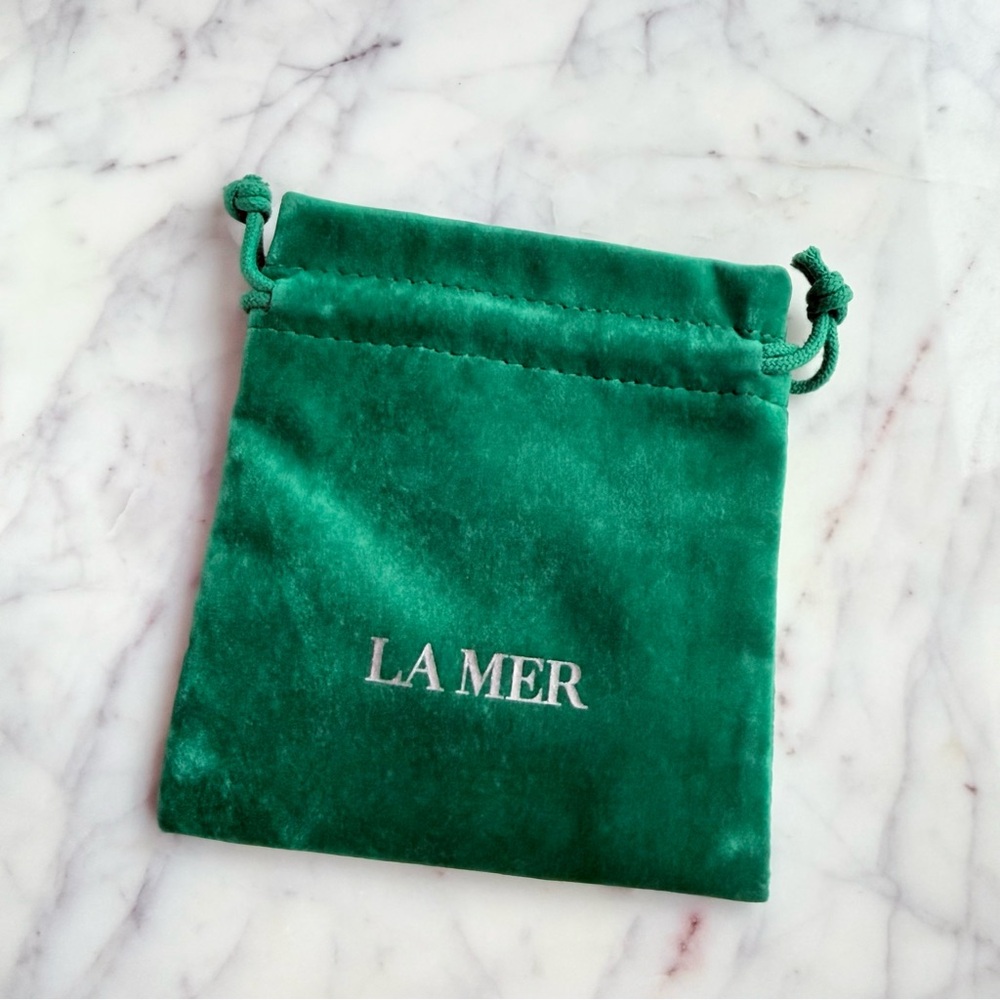 La Mer velvet drawstring storage pouch